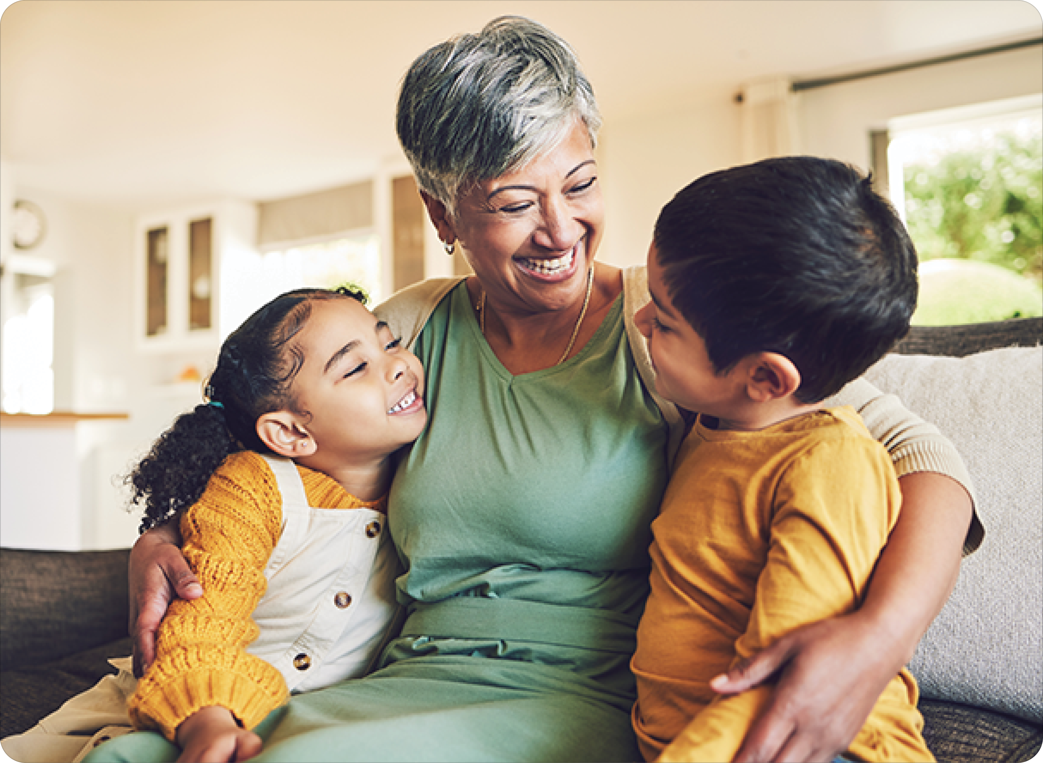 Hug, grandmother or happy kids on a sofa with love