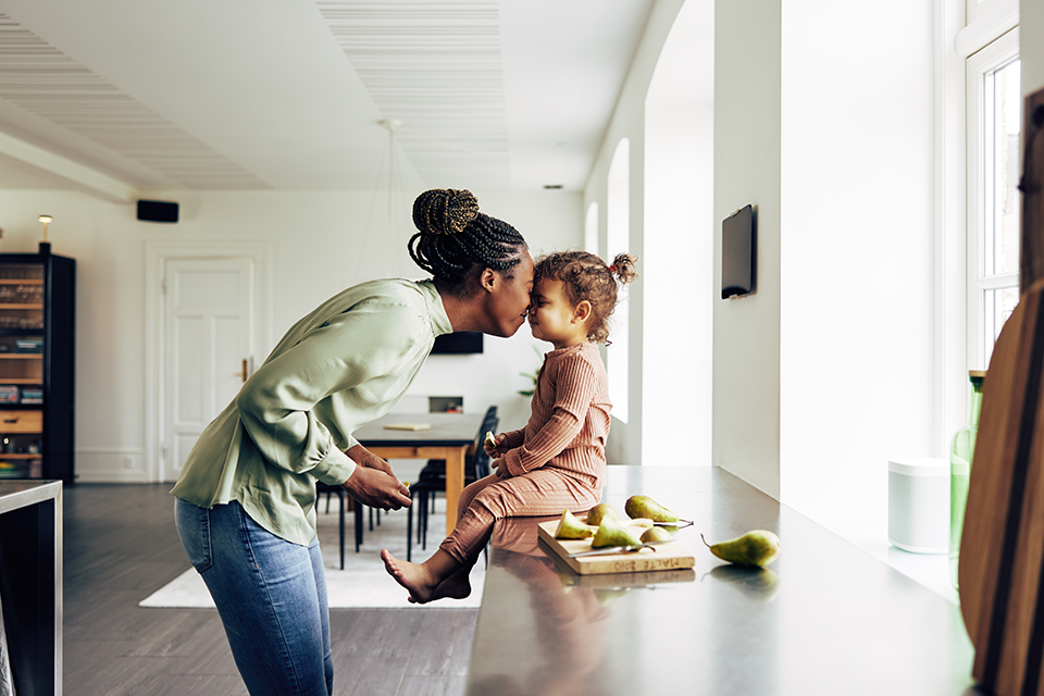 mom and toddler daughter in kitchen